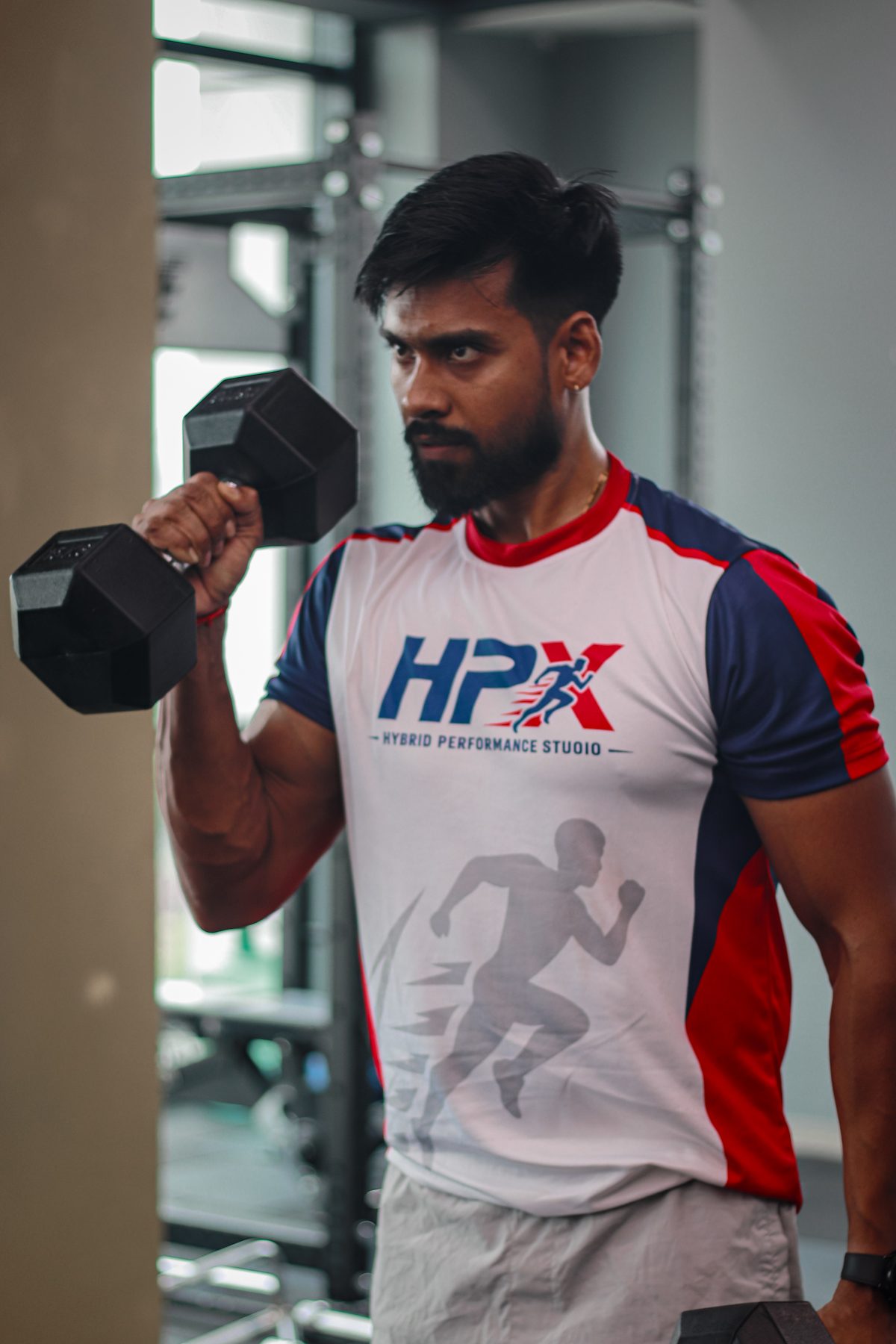 Bicep curl strength training at HPX